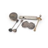 Silver objects including opium spoons, silver flanked cigar cutter and circular pill box, various