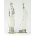 Two large Lladro figures of a doctor and nurse, each 36cm high :For Further Condition Reports Please