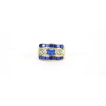 Gold coloured ring set with blue and clear stones, indistinct marks, size J, 4.2g :For Further