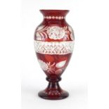 Bohemian ruby glass vase with cut glass roses and a central band of criss cross patterning, 31cm