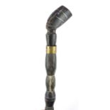 Segmented horn walking stick with figural pommel, 94cm in length :For Further Condition Reports