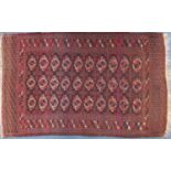 Rectangular Turkmen red ground rug, 230cm x 154cm :For Further Condition Reports Please Visit Our