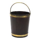 18th century Irish brass bound mahogany peat bucket, with brass swing handle 46cm high excluding the