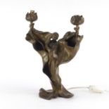 Patinated bronze two branch lamp in the form of an Art Nouveau maiden, signed Mars Vallet, 35cm high