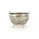 Chinese silver four footed bowl with handles by Tuck Chang & Co, embossed with a dragon, impressed