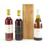 Three bottles of red wine comprising 1984 Château Rieussec Sauternes, 1978 Château Guiraud Sauternes