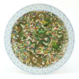 Chinese porcelain charger hand painted in the famille verte palette with dragons amongst clouds, six