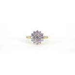 9ct gold purple stone three tier cluster ring, size T, 3.4g :For Further Condition Reports Please