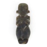 Tribal interest green jade figural carved pendant, 8.5cm high :For Further Condition Reports