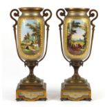 Pair of continental porcelain garniture vases, with bronzed metal mounts, each with panels of