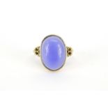 9ct gold cabochon blue stone ring with scroll shoulders, size Q, 3.8g :For Further Condition Reports