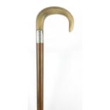 Horn handled walking stick with silver collar, probably rhinoceros horn, 90cm in length :For Further