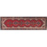 Rectangular carpet runner having an all over geometric motifs, 280cm x 79cm :For Further Condition