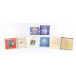 Seven United Kingdom brilliant uncirculated coin collections comprising dates 1984, 1985, 1986,