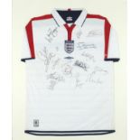 England football jersey signed by sixteen players including David Beckham, Wayne Rooney, John