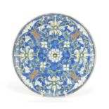 Chinese porcelain plate, hand painted with bats and flowers onto a blue ground, 25cm in diameter :