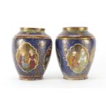 Pair of Islamic metal vases, hand painted with calligraphy and panels of figures and flowers, each