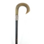 Horn handled walking stick with silver collar and ebonised shaft, probably rhinoceros horn, 81.5cm