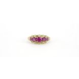 9ct gold ruby five stone ring, size S, 3.0g :For Further Condition Reports Please Visit Our Website.