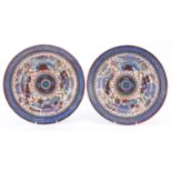 Pair of Japanese porcelain bowls both hand painted with flowers and butterflies, painted marks to
