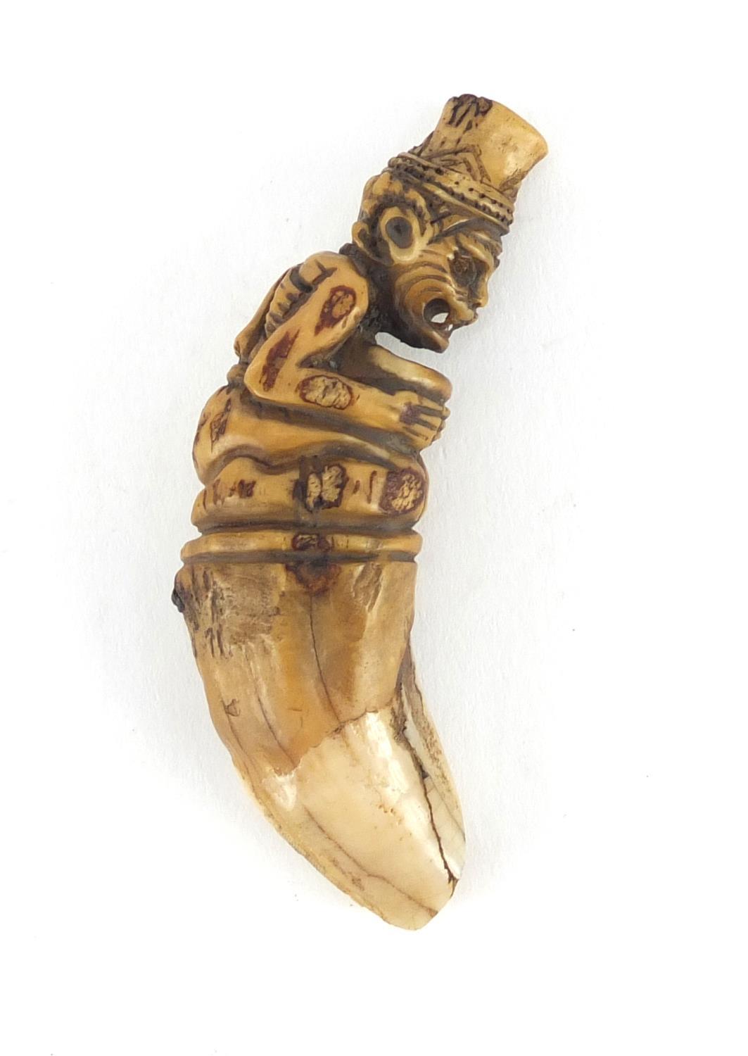 Ivory tooth carved with a monkey, 8cm in length :For Further Condition Reports Please Visit Our