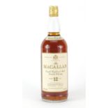 One litre bottle of Macallan twelve's years old whisky :For Further Condition Reports Please Visit