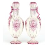 Pair of French pottery vases with ribbon design handles by Gien, each decorated with a panel of