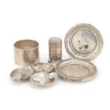 Silver objects comprising napkin ring, miniature caster, five dishes and a Maria Theresa Thaler