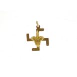 9ct gold swastika pendant, 2.8cm high, 3.0g :For Further Condition Reports Please Visit Our Website.