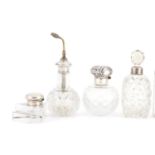 Five Victorian and later silver mounted glass scent bottles, an atomiser and an inkwell, various