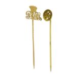 Unmarked gold tie pin and one other, the weight of the gold pin 1.5g :For Further Condition