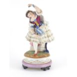19th century hand painted bisque figurine of a female wearing a dress, impressed L & M to the