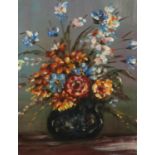 Still life flowers in a vase, oil on board, bearing an indistinct inscriptions verso, mounted and