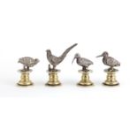 Set of four good quality game bird place card holders including a pheasant and a quail, possibly