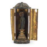 Japanese travel shrine, housed in a lacquered case with gilt interior, the case 29cm high :For