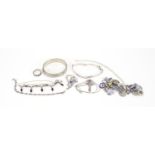 Silver and white metal jewellery including bracelets, enameled charms and rings, 120.0g :For Further