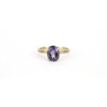 9ct gold purple stone solitaire ring, size T, 2.8g :For Further Condition Reports Please Visit Our