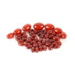 Loose cherry amber coloured beads, the largest 2.4cm in length, 46.7g :For Further Condition Reports