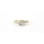 Unmarked gold diamond three stone crossover ring, size N, 2.7g :For Further Condition Reports Please