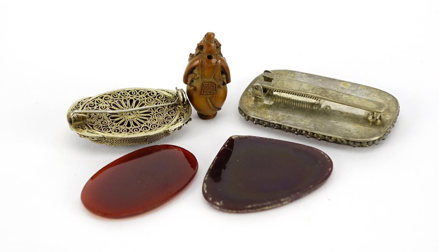 Chinese and Islamic objects including a monkey carved coquilla nut, cinnabar lacquer clip and two - Image 2 of 3