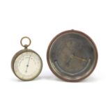 Brass pocket barometer and a desk barometer by L Fischer of Paris, the largest 8cm in diameter :