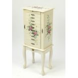 Hand painted floor standing jewellery chest with mirrored interior, ten drawers and two doors,