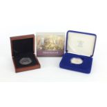 Battle of Trafalgar silver proof commemorative crown and a 1899 US Morgan silver dollar, both with