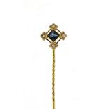 9ct gold sapphire and seed pearl tie pin, housed in a James Walker tooled leather box, 5.5cm long,