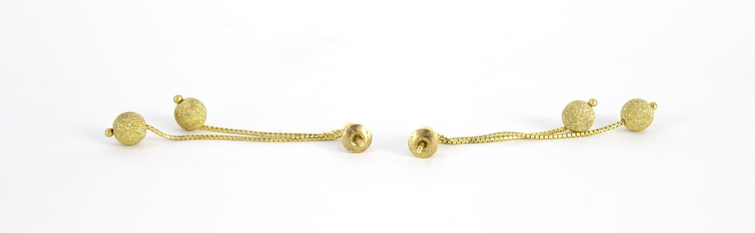 Pair of 9ct gold dangling ball drop earrings, 5cm long, 2.6g :For Further Condition Reports Please - Image 2 of 2