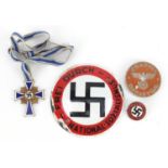 German Militaria including a circular enamel plaque and mothers cross :For Further Condition Reports