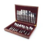 Six place mahogany canteen of stainless steel cutlery, 39cm wide :For Further Condition Reports