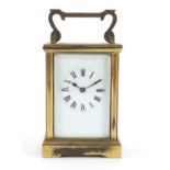 Brass cased carriage clock with enamelled dial and Roman numerals, 11.5cm high :For Further