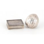 Two silver pill boxes, one in the form of a walnut with gilt interior, the largest 3.8cm in