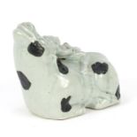 Chinese celadon glazed model of a figure on cow, 20cm in length :For Further Condition Reports